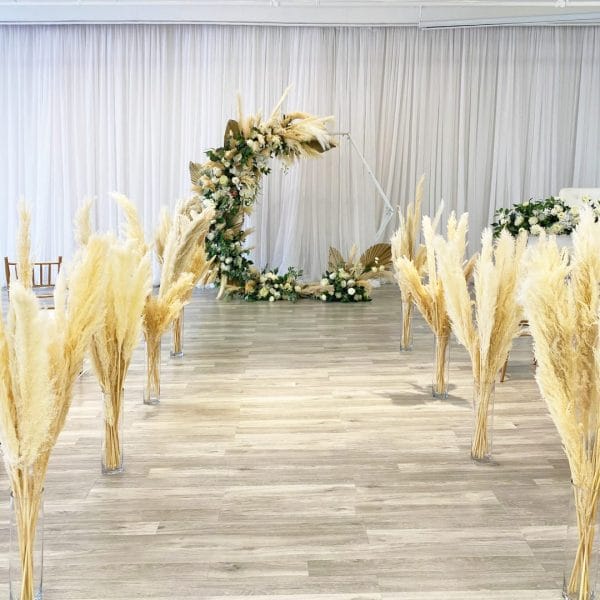 Abby Bohemian with Aisle Markers 01 Abby Bohemian Pampas Arch Backdrop