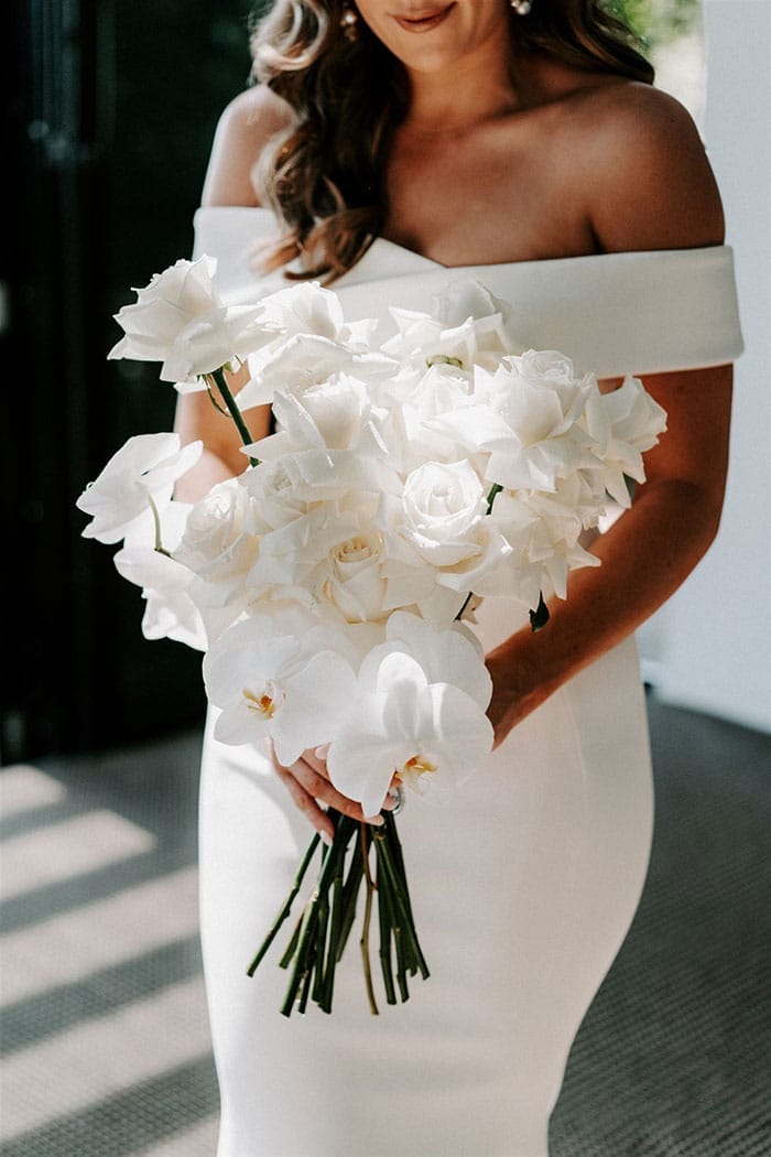 white rose and orchid bouquet fresh