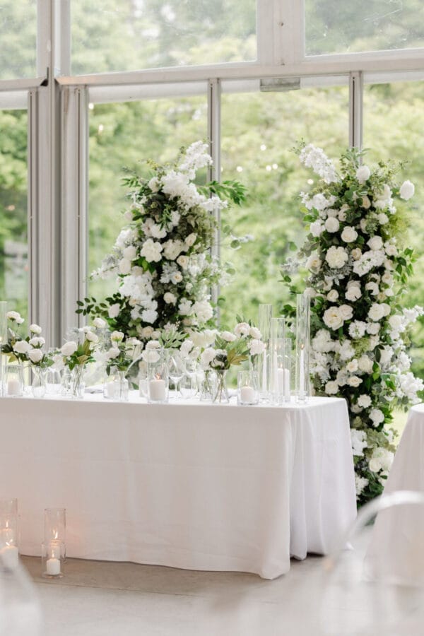 white and green flower arch